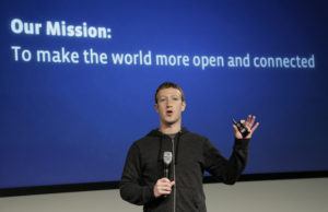 FILE - In this Thursday, March 7, 2013 file photo, Facebook CEO Mark Zuckerberg speaks at the company's headquarters in Menlo Park, Calif. Facebook wants to get more of the world's more than 7 billion people online through a partnership with some of the world’s largest mobile technology companies. Facebook Inc. announced a partnership called Internet.org on Wednesday, Aug. 21, 2013. (AP Photo/Jeff Chiu)