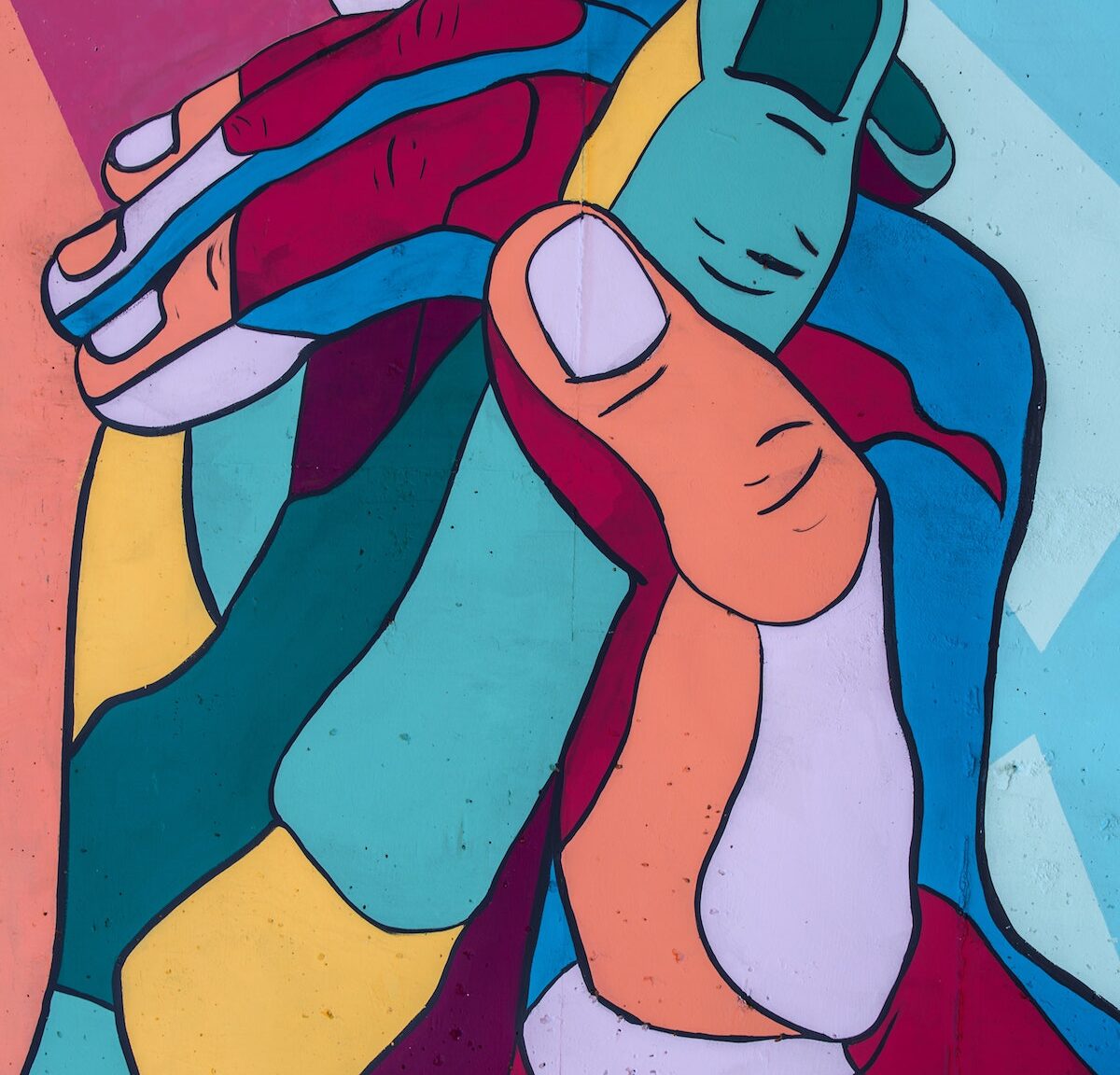 Colorful folded hands