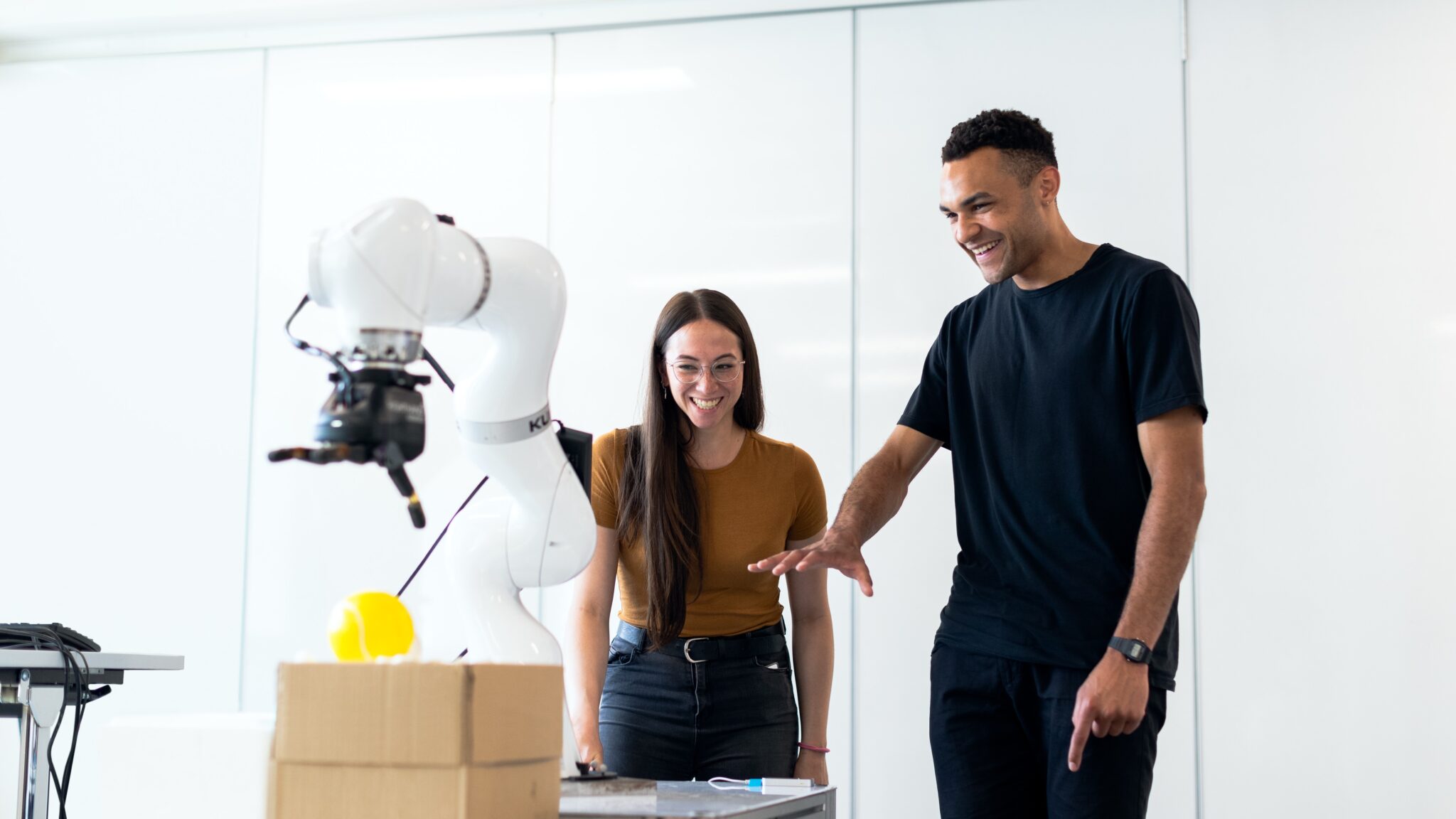 Two people discussing a prototype